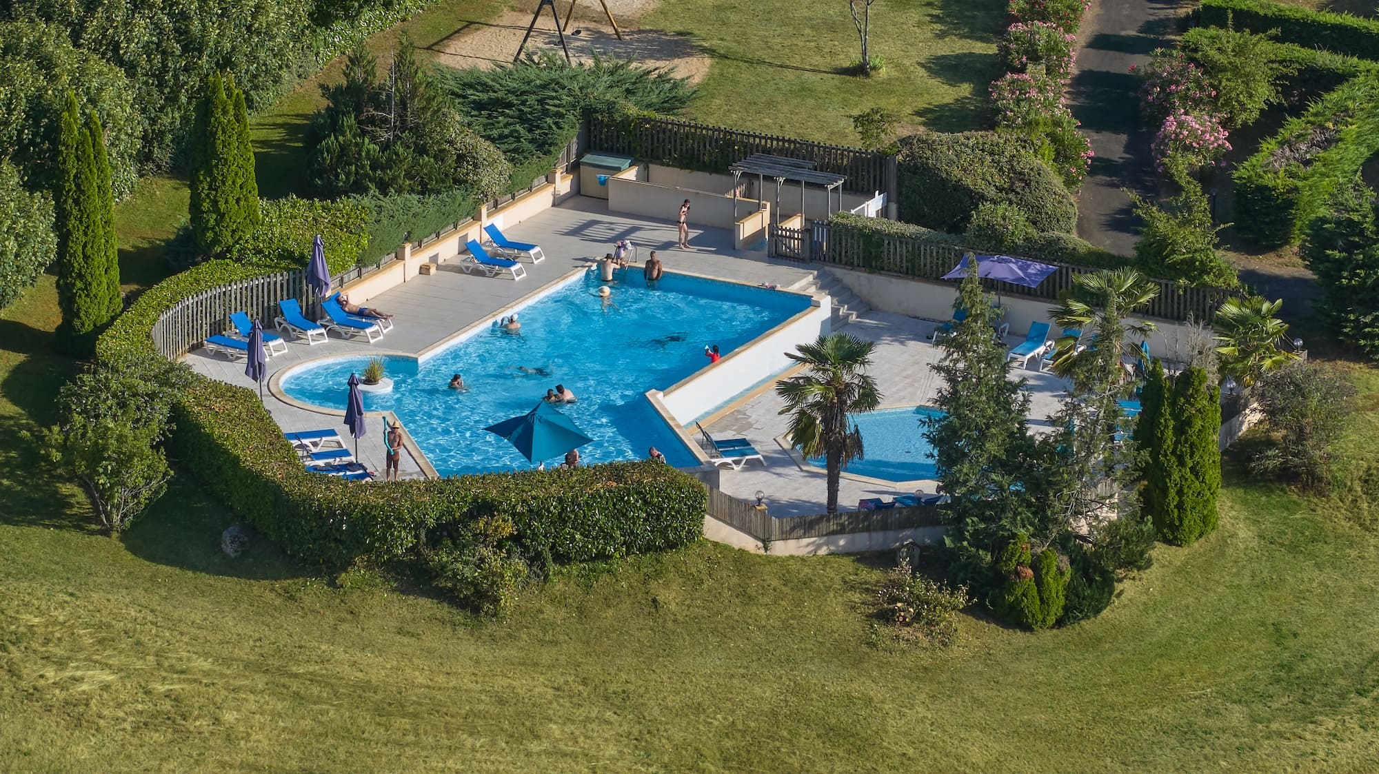 camping le daguet aerial view drone swimming pool dordogne